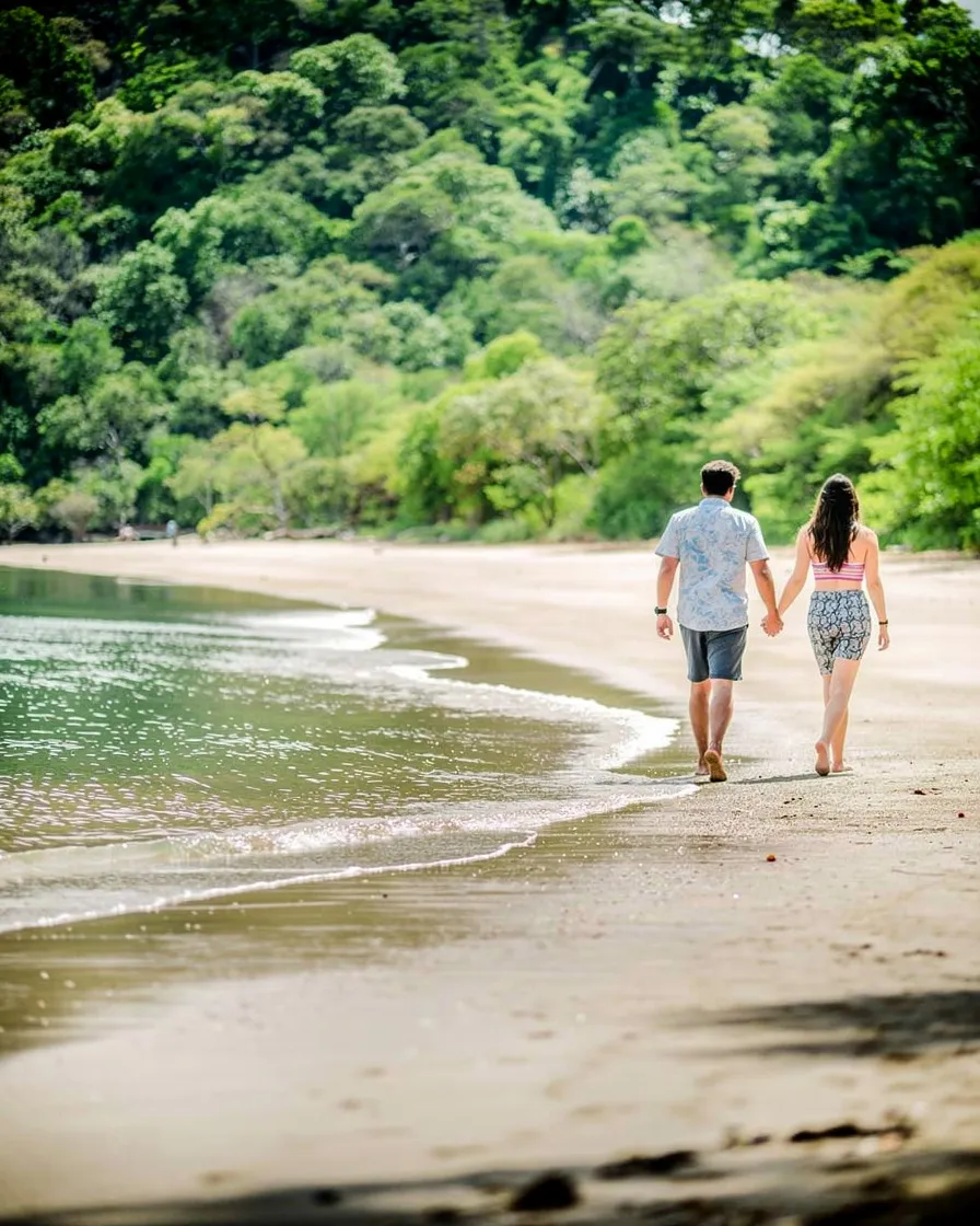 Couple walking on a quiet Costa Rica beach