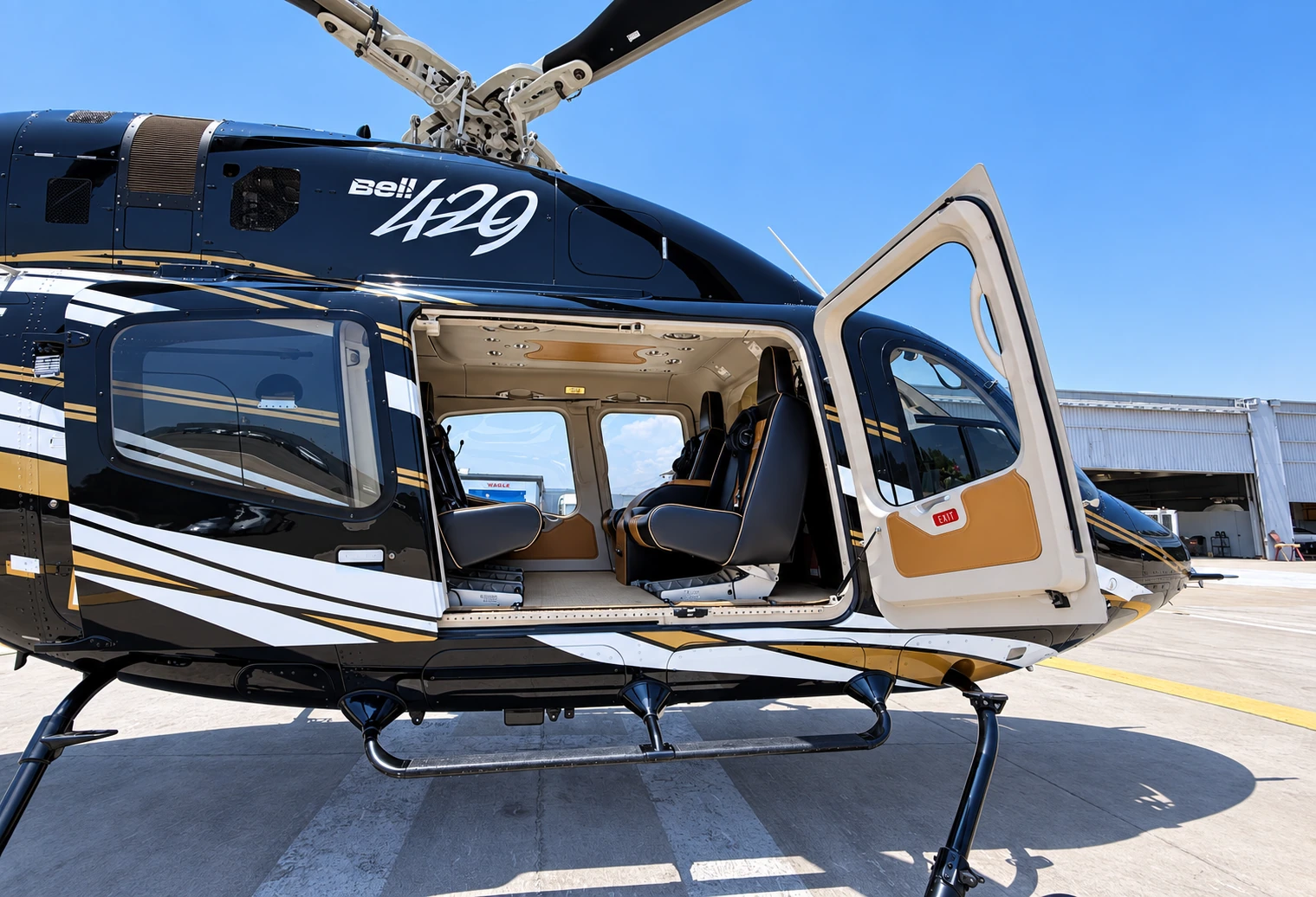 Executive helicopter with the passenger cabin door open