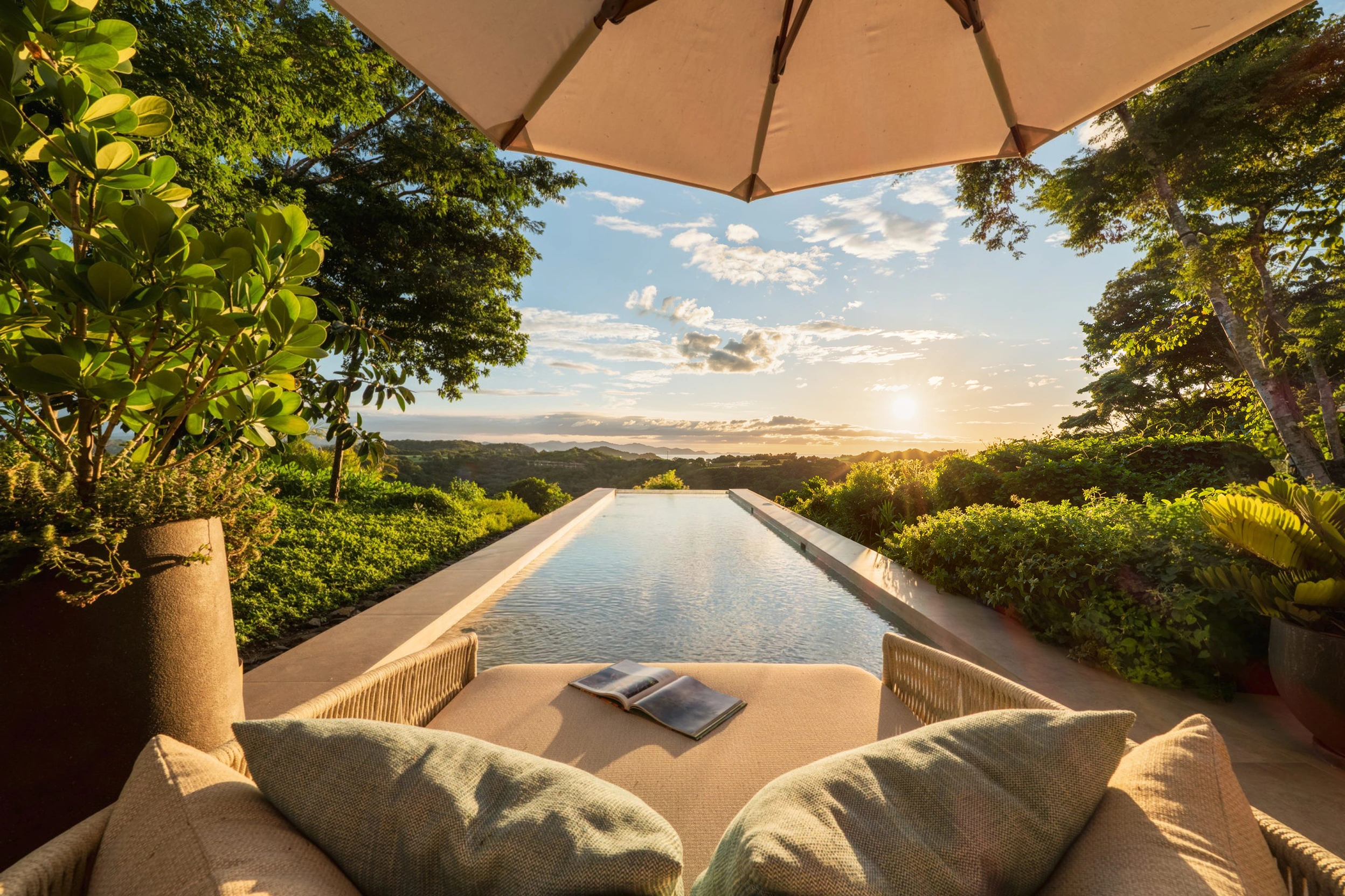 AI-enhanced photograph of Papagayo 4BR Sculpted Bayview Villa: pool and shaded terrace
