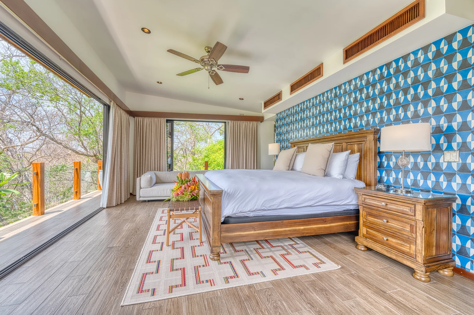 Photograph of Papagayo 6BR Tropical Pool Villa: bedroom overlooking the greenery