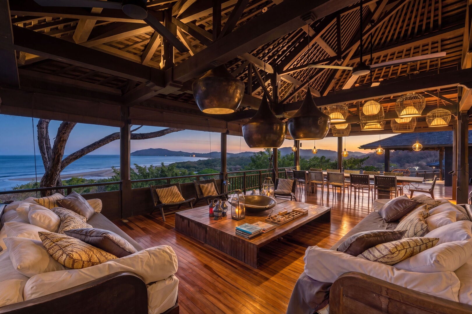 Open-air living pavilion at dusk