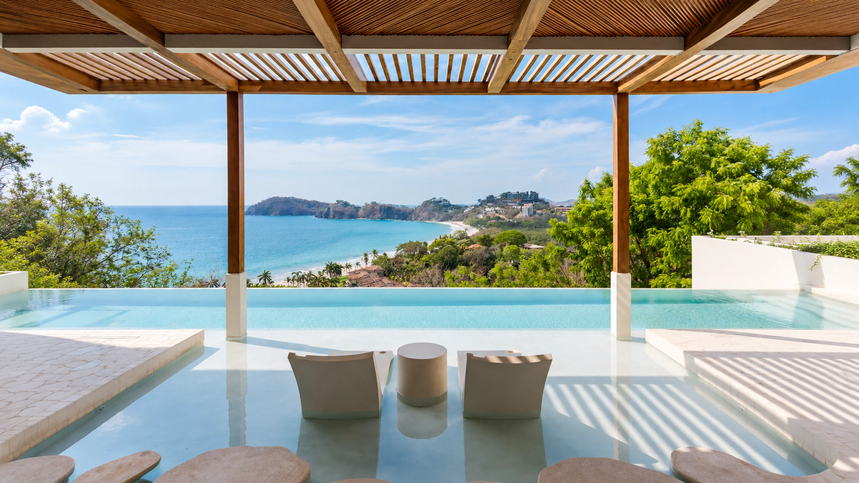 Infinity pool and Pacific view beneath the shaded terrace