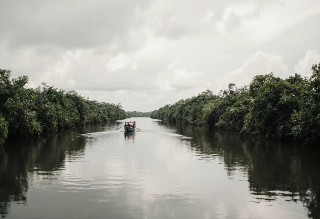 Boat navigating the canals of Tortuguero on Costa Rica’s Caribbean Coast.  
